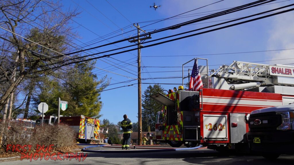 A firefighter near Pittsburgh flies a drone during a residential fire.